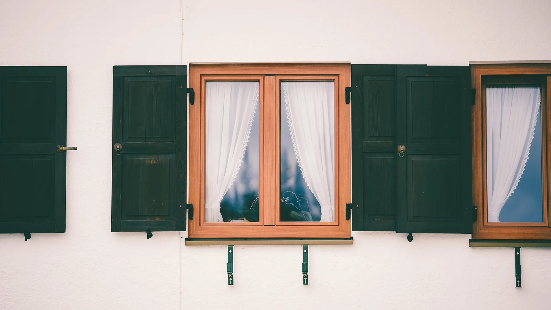 Glass window with a wooden frame